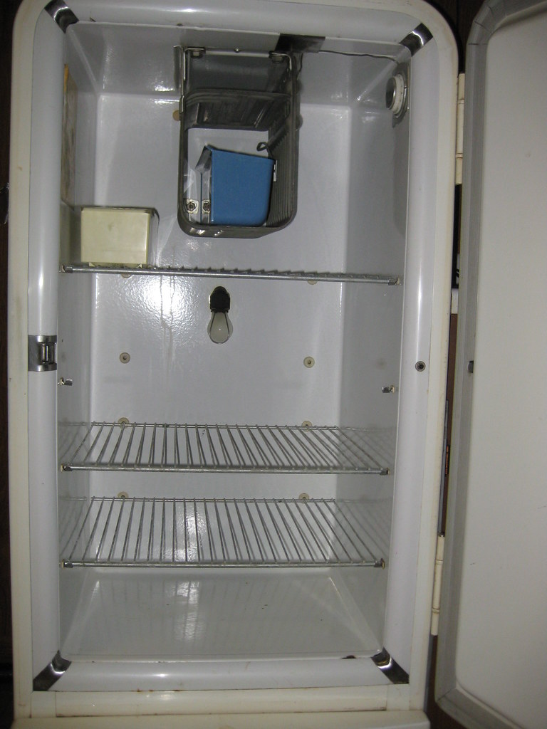 inside old empty fridge